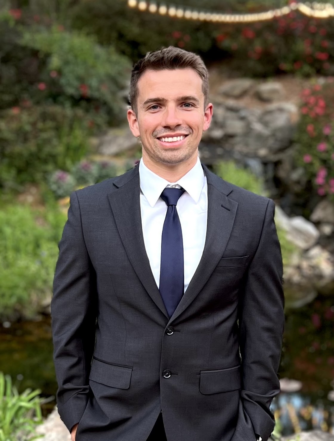 Professional headshot of Pieter Le Roux, AI Systems Architect and founder of Accenzio, wearing business attire and smiling confidently